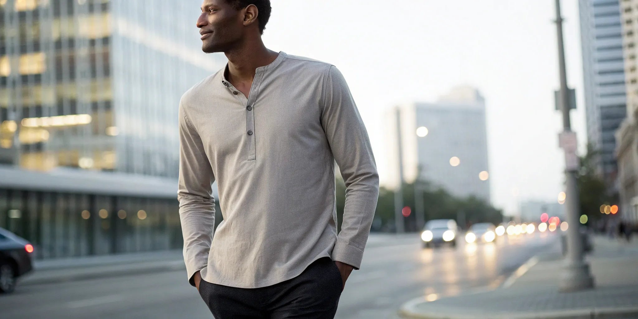 A tall man wearing one of the best long sleeve shirts for a perfect fit.