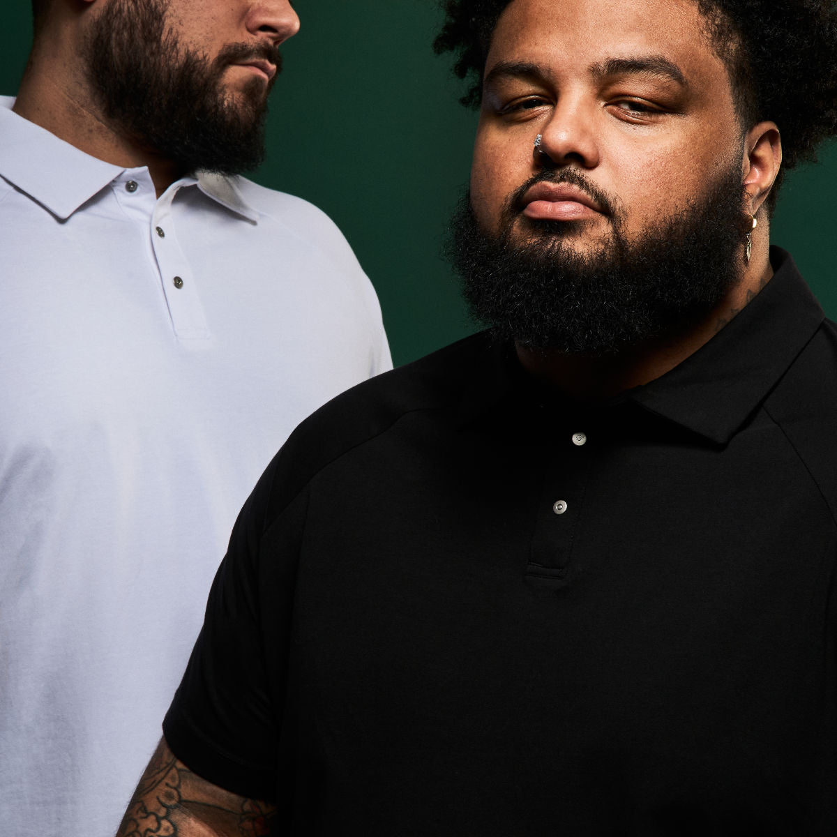Big and tall men wearing a Strongsize everyday stretch polo 