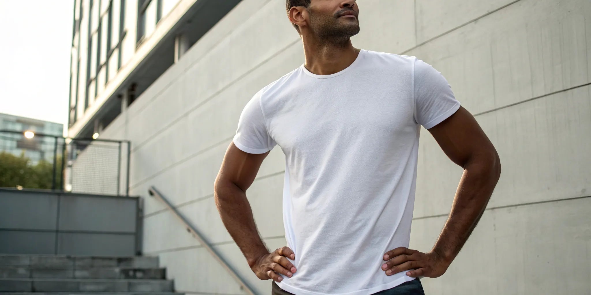 A big guy wearing a white t-shirt, showing the best fit possible for fat guys.